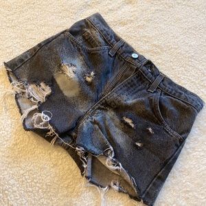 Distressed black denim shorts